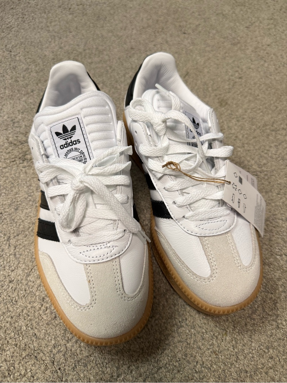 adidas White and Black Low-Top Sneakers with Gum Sole